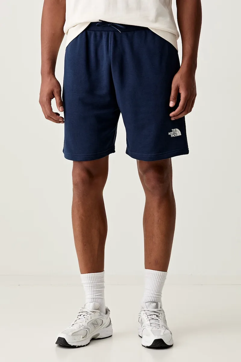The North Face σορτς επίσημα γυναικεία με βαμβάκι SIMPLE DOME LIGHT REGULAR