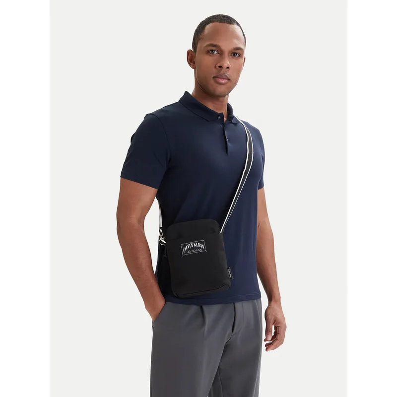 Τσαντάκι Calvin Klein Graphic Capsule Reporter LV04D3346G Μαύρο