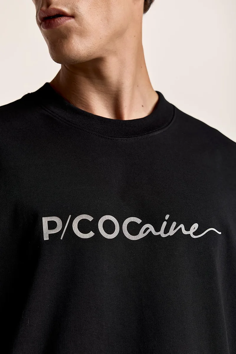 Μαύρο t-shirt με ρεγκλάν μανίκι και μεταλλικό τύπωμα