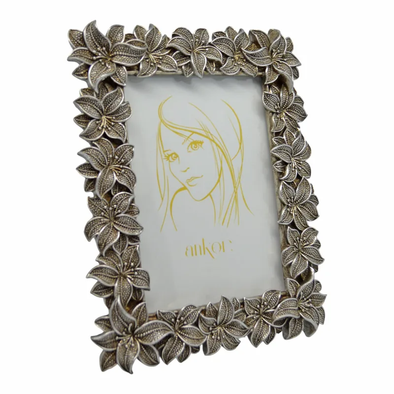 Κορνίζα Με Ανάγλυφα Λουλούδια Ασημί Polyester 13x18cm ANKOR