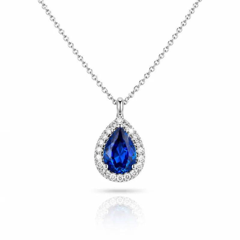 Κολιέ Ροζέτα Σταγόνα από Λευκόχρυσο 9Κ με Royal Blue Ζιργκόν