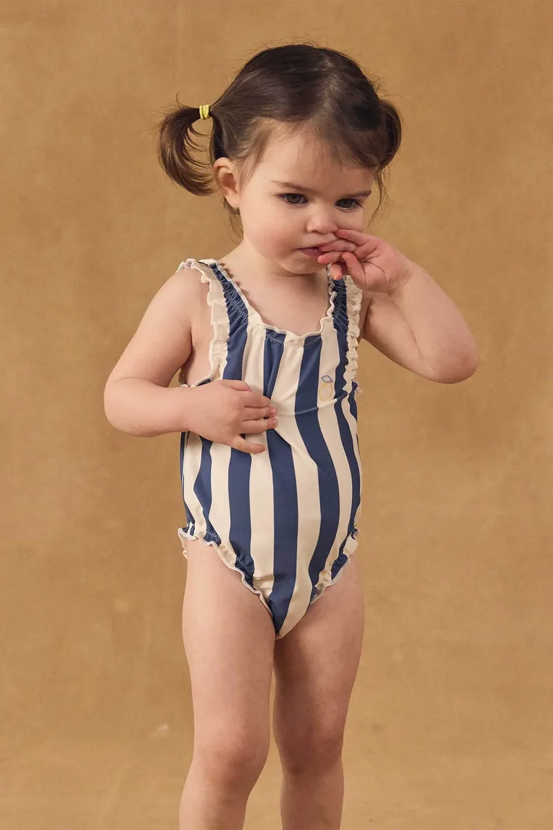 DPAM βρεφικό ολόσωμο μαγιό για κορίτσια "Sicily Stripes" - 376047 Μπλε Σκούρο