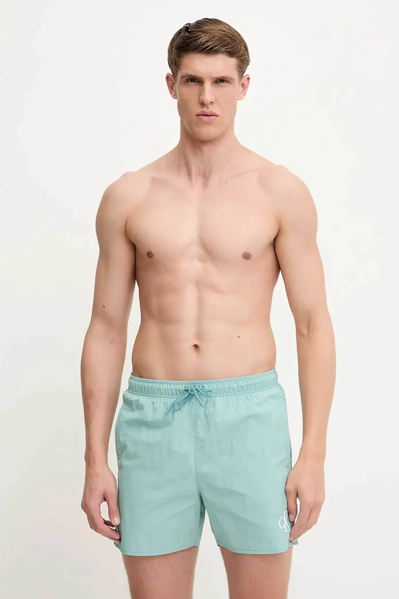 Calvin Klein ανδρικό μαγιό σορτς μονόχρωμο με κεντημένο monogram - KM0KM01102 Βεραμάν Ανοιχτό