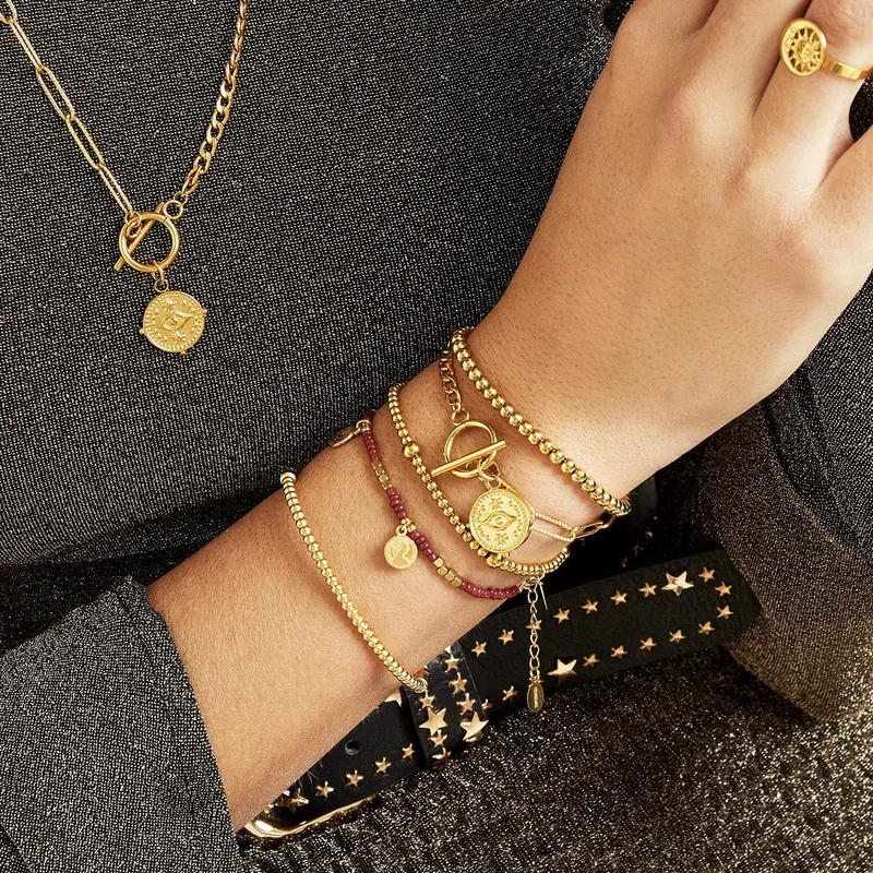 Ατσάλινο χρυσό βραχιόλι Cuoro με μάτι φλουρί the evil eye bracelet